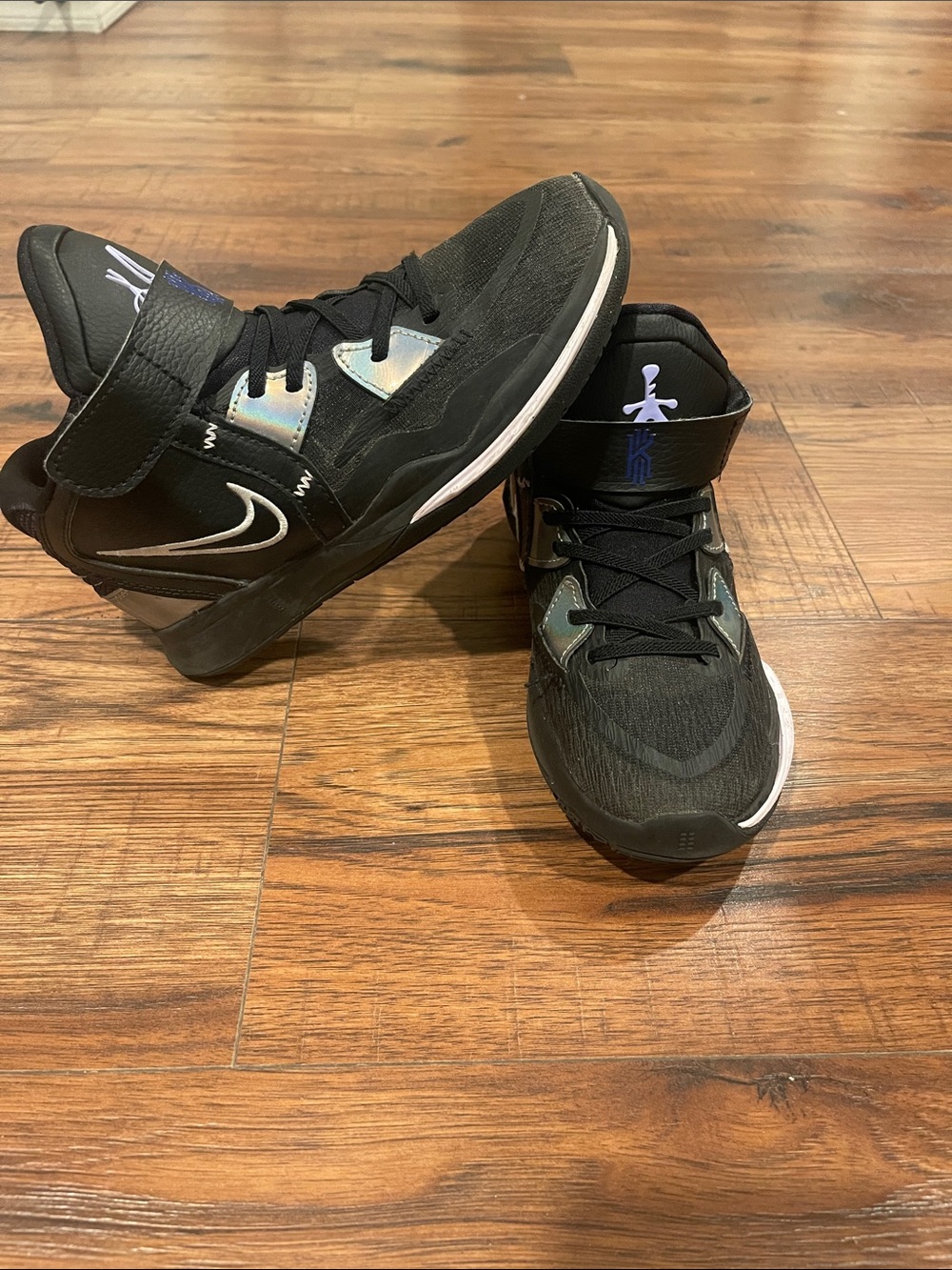 Nike Kids Black High-Top Sneakers with Iridescent Accents. Boys 2.5Y